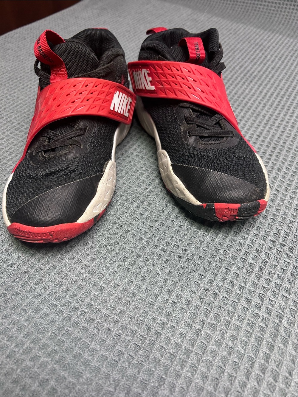 Nike Kids Black and Red Slip-On Sneakers